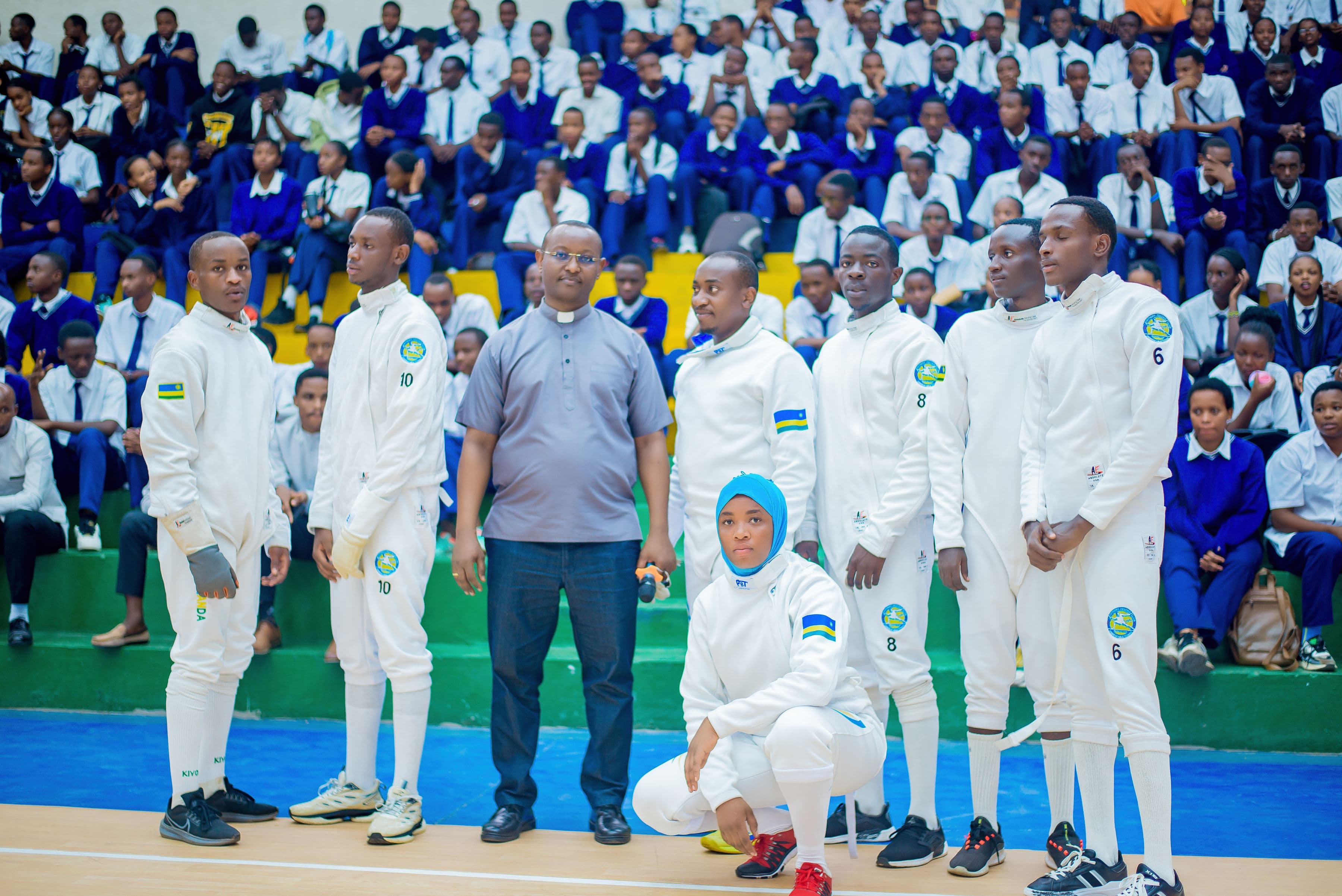 Students learning fencing techniques at a partner school